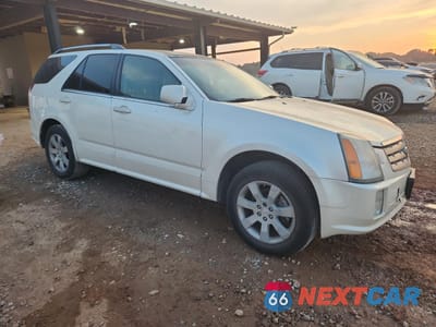 Czwarte zdjęcie samochodu z boku: 2006 CADILLAC SRX VIN:1GYEE63A460148055 - miniatura