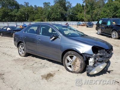 Czwarte zdjęcie samochodu z boku: 2009 VOLKSWAGEN JETTA SE VIN:3VWRZ71K19M080745 - miniatura