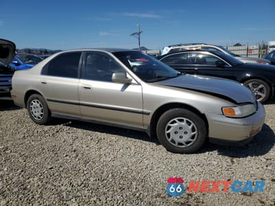 Czwarte zdjęcie samochodu z boku: 1994 HONDA ACCORD LX VIN:JHMCD5637RC115642 - miniatura