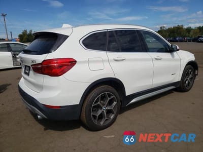 Trzecie zdjęcie samochodu z tyłu: 2017 BMW X1 XDRIVE28I VIN:WBXHT3C32H5F69907 - miniatura