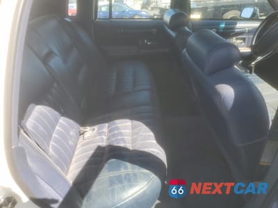 Zdjęcie 10 z 12 samochodu: 1994 LINCOLN TOWN CAR EXECUTIVE VIN:1LNLM81W2RY774196 - miniatura