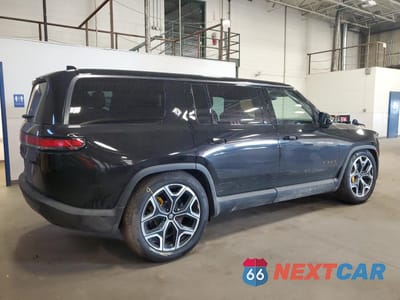Trzecie zdjęcie samochodu z tyłu: 2025 RIVIAN R1S PREMIUM VIN:7PDSGCBP0SN070449 - miniatura