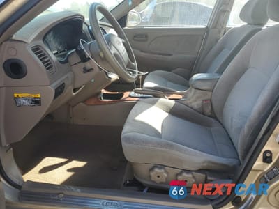 Zdjęcie 7 z 12 samochodu: 2002 KIA OPTIMA MAGENTIS VIN:KNAGD128225158631 - miniatura