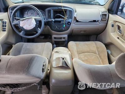 Zdjęcie 8 z 13 samochodu: 2002 MAZDA TRIBUTE VIN:4F2YU09102KM51326 - miniatura