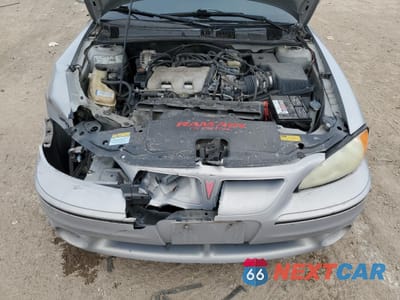 Zdjęcie 11 z 13 samochodu: 2000 PONTIAC GRAND AM GT VIN:1G2NW52E5YC550660 - miniatura