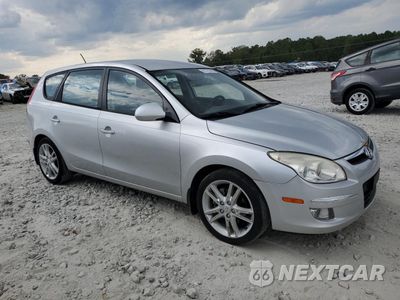 Czwarte zdjęcie samochodu z boku: 2009 HYUNDAI ELANTRA TOURING VIN:KMHDC86E19U040891 - miniatura