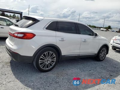 Trzecie zdjęcie samochodu z tyłu: 2016 LINCOLN MKX RESERVE VIN:2LMTJ6LR9GBL75904 - miniatura