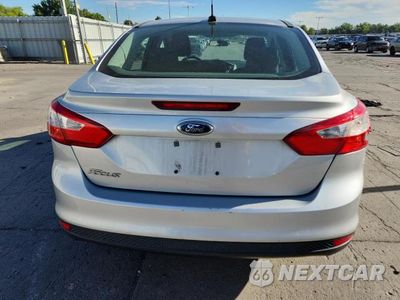Zdjęcie 6 z 12 samochodu: 2014 FORD FOCUS S VIN:1FADP3E26EL294587 - miniatura