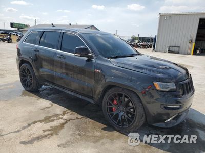 Czwarte zdjęcie samochodu z boku: 2014 JEEP GRAND CHEROKEE SRT-8 VIN:1C4RJFDJ0EC169273 - miniatura