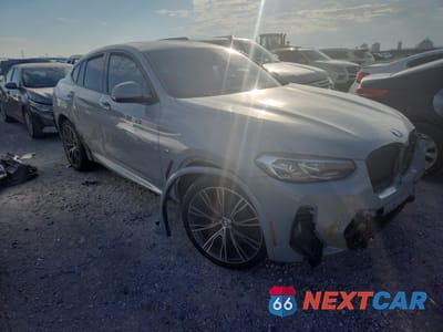 Czwarte zdjęcie samochodu z boku: 2022 BMW X4 XDRIVE30I VIN:5UX33DT05N9K58717 - miniatura