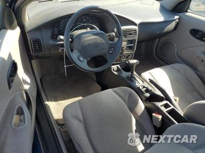 Zdjęcie 8 z 12 samochodu: 2001 SATURN SC1 VIN:1G8ZP128X1Z207319 - miniatura