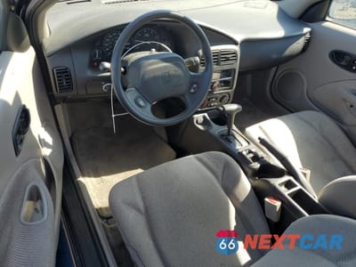 Zdjęcie 8 z 12 samochodu: 2001 SATURN SC1 VIN:1G8ZP128X1Z207319 - miniatura