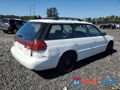 Trzecie zdjęcie samochodu z tyłu: 1999 SUBARU LEGACY L VIN:4S3BK4355X7302452 - miniatura