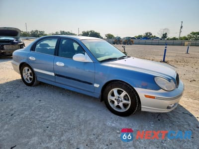 Czwarte zdjęcie samochodu z boku: 2005 HYUNDAI SONATA GLS VIN:KMHWF35HX5A157086 - miniatura