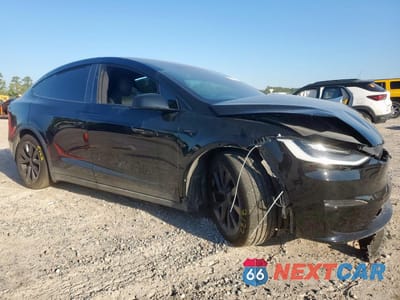 Czwarte zdjęcie samochodu z boku: 2022 TESLA MODEL X VIN:7SAXCBE58NF334942 - miniatura