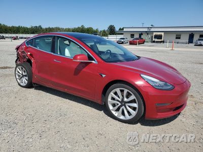 Czwarte zdjęcie samochodu z boku: 2019 TESLA MODEL 3 VIN:5YJ3E1EB7KF454555 - miniatura