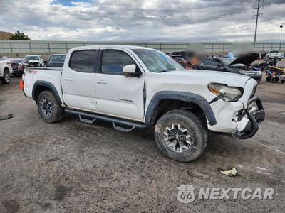 Czwarte zdjęcie samochodu z boku: 2018 TOYOTA TACOMA DOUBLE CAB VIN:3TMCZ5AN7JM123397 - miniatura