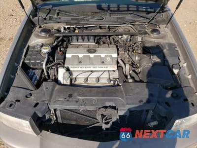 Zdjęcie 11 z 14 samochodu: 1999 CADILLAC DEVILLE VIN:1G6KD54YXXU777513 - miniatura