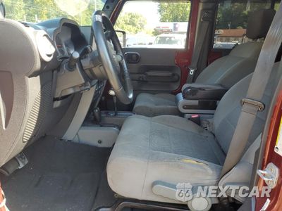Zdjęcie 7 z 12 samochodu: 2008 JEEP WRANGLER UNLIMITED SAHARA VIN:1J8GA59128L527755 - miniatura