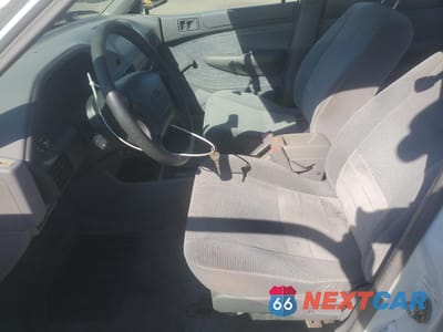 Zdjęcie 7 z 14 samochodu: 1996 FORD ESCORT LX VIN:3FASP13J6TR107918 - miniatura