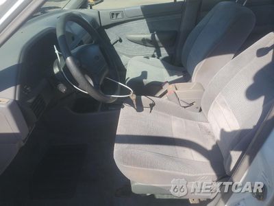 Zdjęcie 7 z 14 samochodu: 1996 FORD ESCORT LX VIN:3FASP13J6TR107918 - miniatura