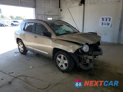 Czwarte zdjęcie samochodu z boku: 2010 JEEP COMPASS SPORT VIN:1J4NF1FB5AD642964 - miniatura