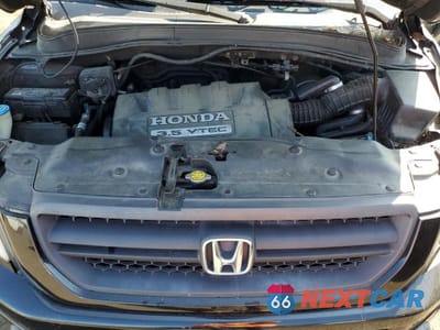 Zdjęcie 11 z 12 samochodu: 2005 HONDA PILOT EX VIN:2HKYF18415H571215 - miniatura