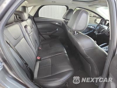 Zdjęcie 10 z 12 samochodu: 2013 FORD FOCUS TITANIUM VIN:1FADP3J25DL363080 - miniatura