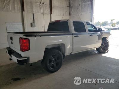 Trzecie zdjęcie samochodu z tyłu: 2018 CHEVROLET SILVERADO K1500 HIGH COUNTRY VIN:3GCUKTEC2JG205369 - miniatura