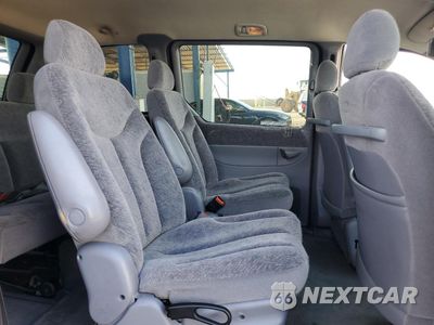 Zdjęcie 11 z 14 samochodu: 2000 PLYMOUTH VOYAGER SE VIN:2P4GP45G7YR558531 - miniatura