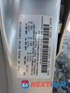 Zdjęcie 12 z 12 samochodu: 2003 MAZDA PROTEGE DX VIN:JM1BJ225X30137123 - miniatura