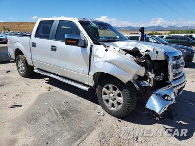 Czwarte zdjęcie samochodu z boku: 2014 FORD F150 SUPERCREW VIN:1FTFW1ET4EKE21815 - miniatura
