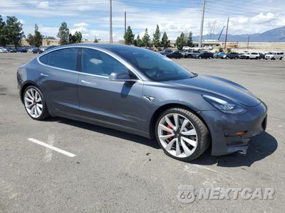 Czwarte zdjęcie samochodu z boku: 2019 TESLA MODEL 3 VIN:5YJ3E1EB9KF528767 - miniatura