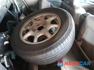 Zdjęcie 12 z 13 samochodu: 2001 BUICK PARK AVENUE VIN:1G4CW54K614278007 - miniatura