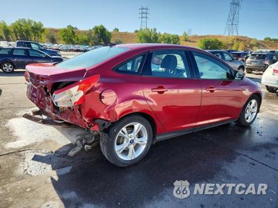 Trzecie zdjęcie samochodu z tyłu: 2014 FORD FOCUS SE VIN:1FADP3F26EL197405 - miniatura