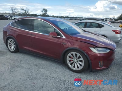 Czwarte zdjęcie samochodu z boku: 2016 TESLA MODEL X VIN:5YJXCAE41GFS00503 - miniatura