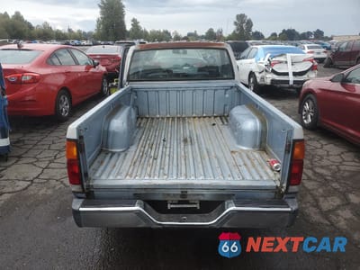 Zdjęcie 6 z 12 samochodu: 1991 NISSAN TRUCK SHORT WHEELBASE VIN:1N6SD11SXMC311083 - miniatura