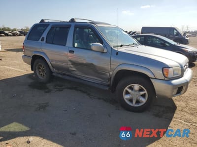 Czwarte zdjęcie samochodu z boku: 2001 NISSAN PATHFINDER LE VIN:JN8DR09Y91W576513 - miniatura