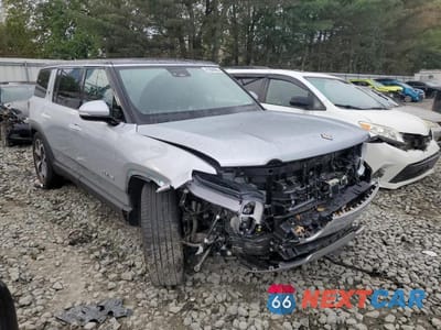 Czwarte zdjęcie samochodu z boku: 2024 RIVIAN R1S ADVENTURE VIN:7PDSGBBA7RN044317 - miniatura