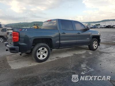 Trzecie zdjęcie samochodu z tyłu: 2018 CHEVROLET SILVERADO K1500 LT VIN:3GCUKREC1JG568659 - miniatura