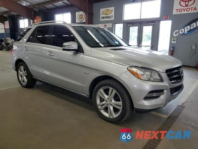 Czwarte zdjęcie samochodu z boku: 2012 MERCEDES-BENZ ML 350 BLUETEC VIN:4JGDA2EB6CA033017 - miniatura