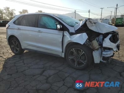 Czwarte zdjęcie samochodu z boku: 2019 FORD EDGE VIN:2FMPK4AP6KBB69917 - miniatura