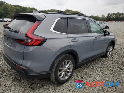 Trzecie zdjęcie samochodu z tyłu: 2023 HONDA CR-V EXL VIN:2HKRS4H79PH431038 - miniatura