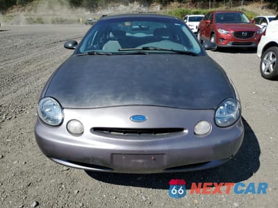 Piąte zdjęcie samochodu w środku: 1996 FORD TAURUS GL VIN:1FALP52U9TA247169 - miniatura