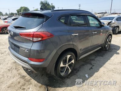 Trzecie zdjęcie samochodu z tyłu: 2017 HYUNDAI TUCSON LIMITED VIN:KM8J3CA29HU521120 - miniatura