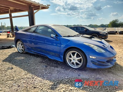 Czwarte zdjęcie samochodu z boku: 2002 TOYOTA CELICA GT VIN:JTDDR32T0Y0024357 - miniatura