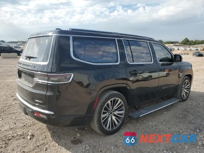 Trzecie zdjęcie samochodu z tyłu: 2023 JEEP GRAND WAGONEER SERIES III VIN:1C4SJVGP8PS562474 - miniatura