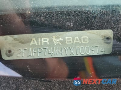 Zdjęcie 12 z 12 samochodu: 2000 FORD CROWN VICTORIA LX VIN:2FAFP74W4YX100974 - miniatura