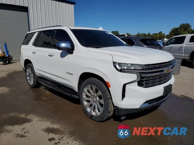 Czwarte zdjęcie samochodu z boku: 2023 CHEVROLET TAHOE K1500 PREMIER VIN:1GNSKSKD0PR217513 - miniatura