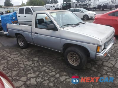 Czwarte zdjęcie samochodu z boku: 1991 NISSAN TRUCK SHORT WHEELBASE VIN:1N6SD11SXMC311083 - miniatura